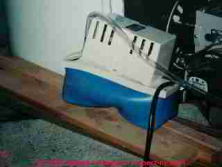 Photograph of a damaged A/C condensate pump