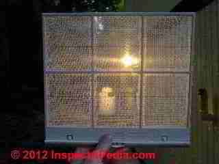 Dirty & clean air filters side by side (C) Daniel Friedman