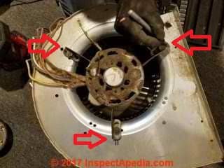 Cleaning the blower assembly of an air handler unit  (C) Daniel Friedman James Agzigian