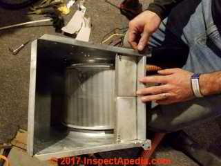 Cleaning the blower assembly of an air handler unit  (C) Daniel Friedman James Agzigian