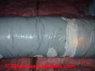 Photograph of  heat-deterioration of Goodman Gray Flex Duct in an attic