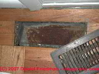 Photograph of rusty air conditioning duct register
