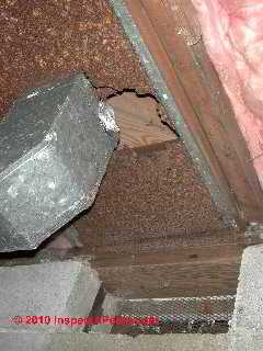 Photo of severe rust damage to return air duct 