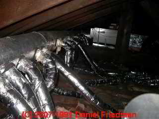 Photo of multiple flex duct HVAC lines off of a main trunk (C) Daniel Friedman