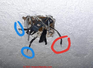 Solid aluminum conductors at a light switch (C) InspectApedia.com Eric