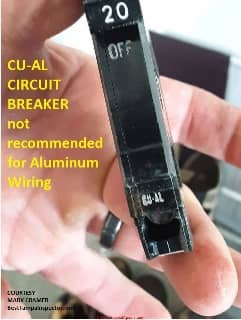 CU-AL circuit breaker (C) InspectApedia.com Mark Cramer BestTampaInspector.com