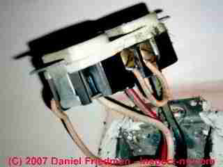 Photograph of a back-wired aluminum wired electrical outlet