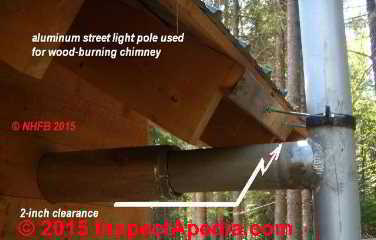 Unsafe single wall metal chimney made from an aluminum light pole (C) InspectApedia.com NHFireBear