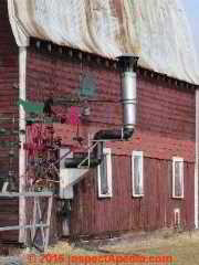 Single metal flue through a barn wall north of Duluth (C) Daniel Friedman