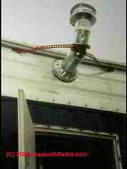 Unsafe heating chimney on mobile home (C) Daniel Friedman