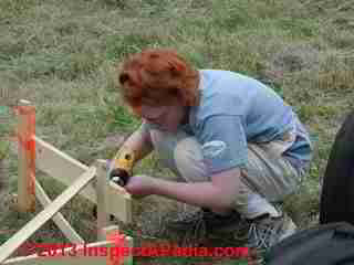 Kelsey Klug constructing the batter boards for the Summerblue Arts Camp stage decking (C) Daniel Friedman