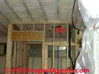 Spray foam insulation installation in ceiligings & walls (C) Daniel Friedman