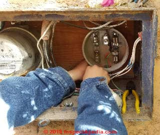 Installing replacement connector in a damaged electric meter base (C) Daniel Friedman at InspectApedia.com