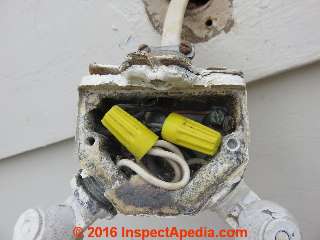 Obsolete outdoor floodlight fixture to be replaced (C) Daniel Friedman