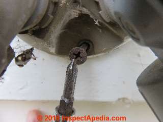 Drywall screw used at outdoor light fixture (C) Daniel Friedman