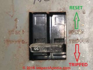 GE FPE breaker panel showing breaker tripped position (C) InspectApedia.com