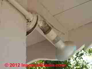 Unsafe outdoor lighting © D Friedman at InspectApedia.com 