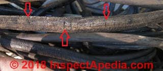 Cracked unsafe elecgtrical wire insulation (C) Inspectapedia.com