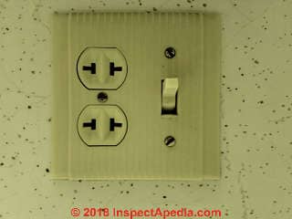 Un grounded electrical receptacle installed in 1962 stopped working, was replaced, then examined (C) Daniel Friedman at InspectApedia.com