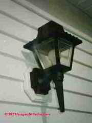 Unsafe outdoor lighting © D Friedman at InspectApedia.com 