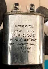 Run capacitor, rated at 7.5 microfarads (C) InspectApedia.com Robert