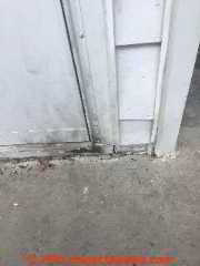 Burn and soot marks on metal siding and  on building entry door traced to SEC short to ground (C) InspectApedia.com PA DF