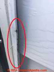 Arcing burns on metal siding following electrical service entry cable short & burn (C) InspectApedia.com DF PA