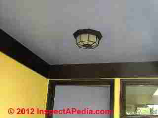 Outdoor soffit surface mount fixture © D Friedman at InspectApedia.com 