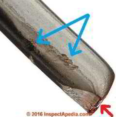Closeup of tinned copper electrical wire surface (C) InspectApedia
