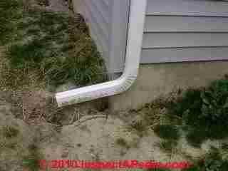 Downspout empties too close to building (C) Daniel Friedman