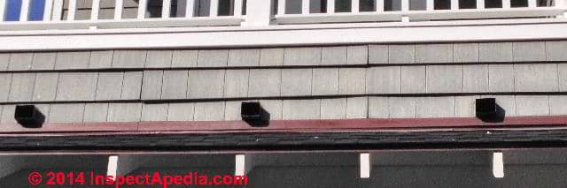 Curled or "buckled" fiber cement siding (C) InspectApedia ED