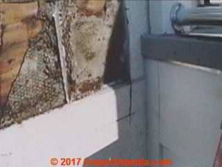Cementious stucco hard coat wall leak evidence (C) InspectApedia.com Ron McClure