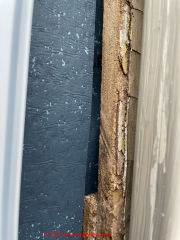 End cut view of siding helps identify the material as plant-fibre or wood based hardboard (C) InspectApedia.com Ott