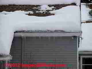 Cape cod roof snow  melt © D Friedman at InspectApedia.com 