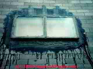 Tarred leaky skylight (C) Daniel Friedman