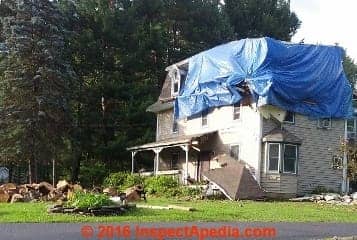Tree falls, knocks porch off of home (C) Daniel Friedman