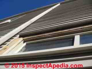 Stripping window trim to find leaks at walls (C) InspectAPedia GS