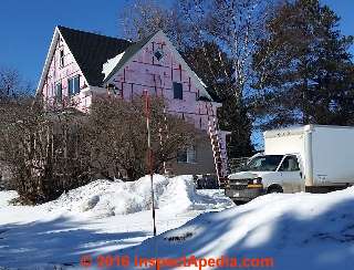 Vinyl siding installation at very low temperatures in Two Harbors MN (C) Daniel Friedman 2016