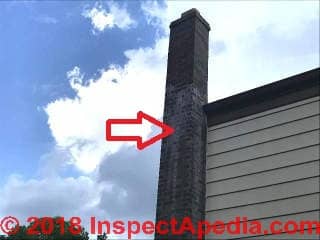 White stains on chimney due to gas combustion flue product leaks may be very dangerous (C) InspectApedia.com
