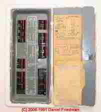 Photograph of a typical Federal Pacific Electric Stab-Lok® electric panel cover and door label. More
FPE identification photographs are listed below.