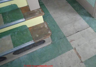 Green and white asbestos floor tiles (C) InspectApedia.com Lois