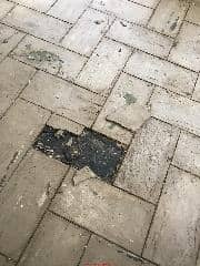 Asbestos suspect floor tile from 1953  (C) Inspectapedia.com Dan