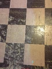 Asbestos floor tiles at InspectApedia.com