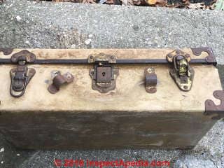 Antique suitcase liner may contain asbestos (C) InspectApedia.com Ed Melusky