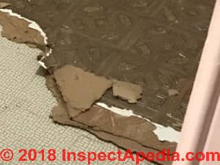 Asbestos containing floor tiles and sheet flooring in layers (C) InspectApedia.com Ben