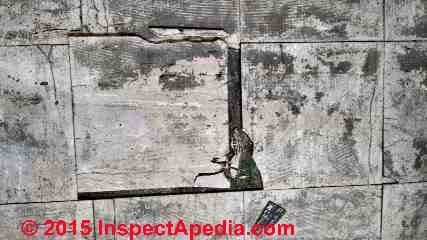 Armstrong asphalt asbestos floor tiles in poor condition (C) InspectApedia.com MD