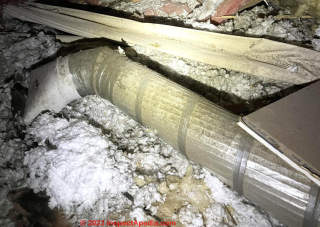 possible asbestos paper wrap (C) InspectApedia.com Dan