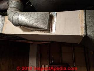 Metal asbestos-like paper on the outside of a galvanized sheet metal heating air duct (C) InspectApedia.com reader Allen