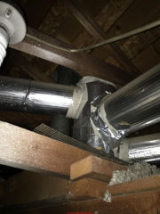 Asbestos paper tape on HVAC Duct Joints ? (C) InspectApedia.com Wendy