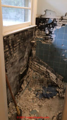Bath ceramic tie demolition: asbestos in any of the materials? (C) InspectApedia.com Carol